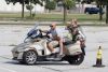 A couple on a Cam-Am Spyder navigating through cones. Copyright: Sherwood Archibald, 2025.  Used with permission.